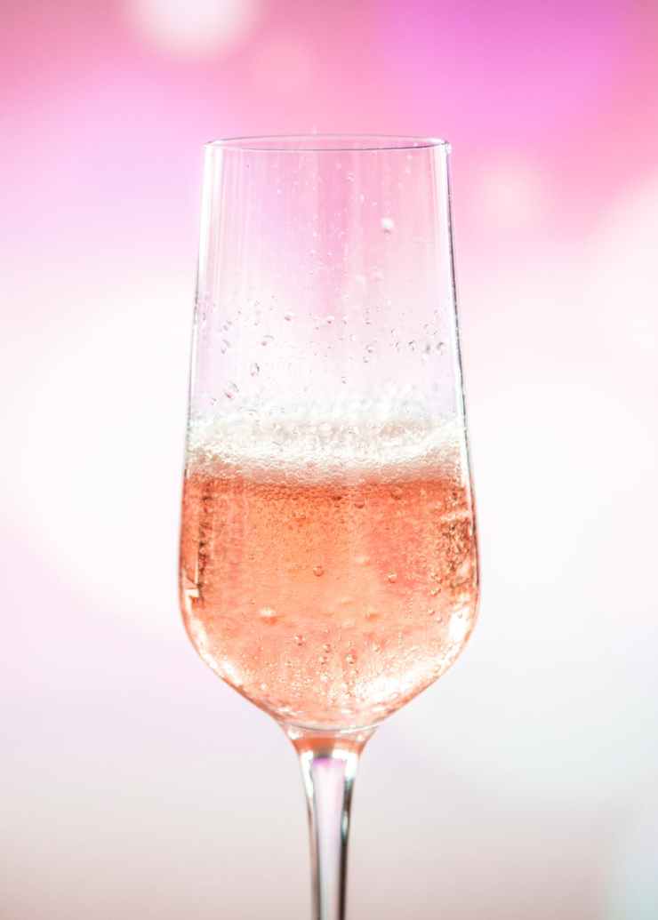 clear champagne flute with liquid
